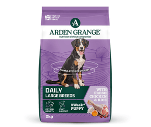 A 2kg bag of Arden Grange, Daily, Large Breeds 8 Week+ Puppy food, featuring a purple and green bag with a picture of a tri-coloured dog.
