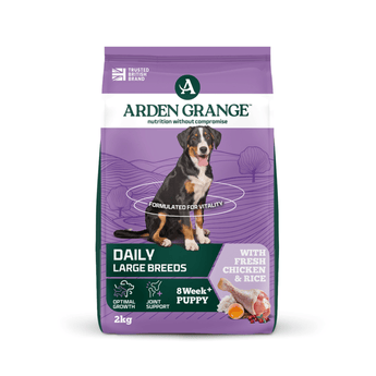 A 2kg bag of Arden Grange, Daily, Large Breeds 8 Week+ Puppy food, featuring a purple and green bag with a picture of a tri-coloured dog.