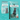 Two Arden Grange dog food packages on a teal background, demonstrating the recent change in packaging.