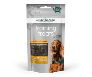 A 90g bag of Arden Grange Training Treats (duck & superfoods) for dogs, featuring a grey and white package with a picture of a brown dog on the front.