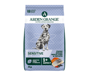 A 2kg bag of Arden Grange Advanced Sensitive, All Breeds dog food, featuring a Dalmatian illustration on a light blue patterned background with green and white accents.
