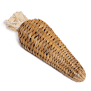 Woven banana leaf shaped into a carrot with a leaf top on a white background. 