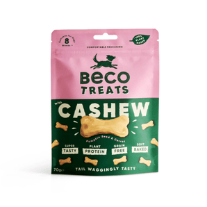 White background with a packet of Beco Dog Treats pictured. On the packet is an illustrated silhouette of a running dog. Text on the pack reads, 'Beco Treats, Cashew' with a picture of a bone shaped treat, text below reads 'Pumpkin seed & Carrot, Tail Waggingly Tasty.'  
