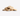 White background with a pile of disc shaped dog treats. 