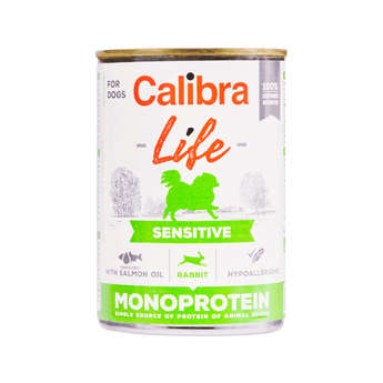 A can of Calibra Life Sensitive Monoprotein dog food, designed for dogs with sensitive stomachs. The can features a white label with green and orange text, a green silhouette of a dog, and illustrations of salmon oil, rabbit, and hypoallergenic icons.