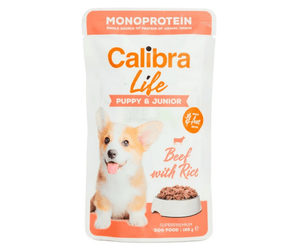 Calibra Life Puppy & Junior Beef with Rice monoprotein dog food pouch, featuring a corgi illustration on a white and orange background.