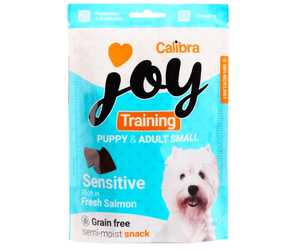 A packet of Calibra Joy Training Puppy & Small Adult dog treats, featuring a west highland terrier on the packaging against a white background.