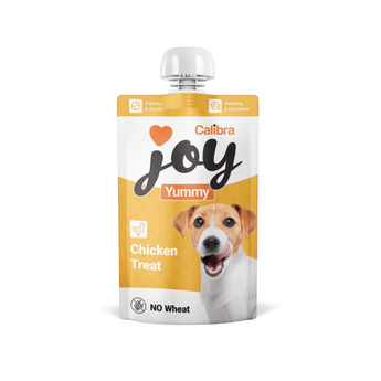 White background with a white and yellow pouch of Calibra Joy Yummy paste treat in Chicken flavour.