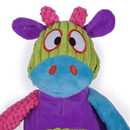 Close up of plush cartoon multi-coloured cow dog toy, patches of blue, green, purple and pink all over. Stitched eye, nostril and smile details on the face. Pictured on a white background. 