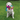 Yellow Labrador dog with lush cartoon multi-coloured cow dog toy, patches of blue, green, purple and pink all over. Pictured on a white background. 