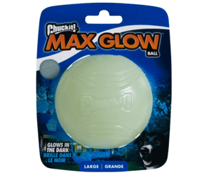 White background with a pack of one ChuckIt! Max Glow large dog ball, pictured on the pack is a Collie dog. 