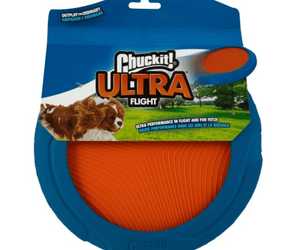 Frisbee style toy with a blue rudder outer rim and orange nylon inside, pictured in a cardboard sleeve with a brown and white dog chasing a picture of the frisbee, with text saying 'Chuckit! Ultra Flight' and 'Ultra performance in flight and for fetch' all on a white background. 
