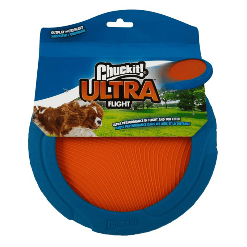 Frisbee style toy with a blue rudder outer rim and orange nylon inside, pictured in a cardboard sleeve with a brown and white dog chasing a picture of the frisbee, with text saying 'Chuckit! Ultra Flight' and 'Ultra performance in flight and for fetch' all on a white background. 