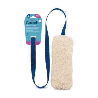 White background with a soft faux lambs wool the Coachi Chase & Crinkle chase toy with a blue bungee handle, attached to a blue cardboard tag. 