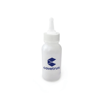 White background with a CVET nursing bottle, with a Covetrus logo printed on the bottle.