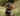 Dog Muzzle with Leather Strap on dog outside in grass