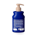 White background with a back view of a blue bottle of Douxo Ultra-safe Shed Control Shampoo with a beige pump. 
