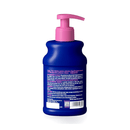White background with a back view of a blue bottle of Douxo Ultra-safe Itch Soothing Shampoo with pink pump. 