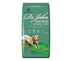 White background with an green bag of Dr.John Hypoallergenic Chicken and Oats dry food. Pictured on the bag is an illustrated Labrador dog in a farm field. 