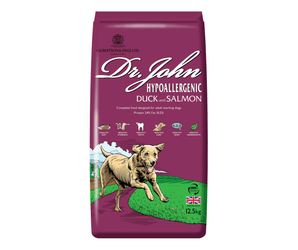 White background with an purple bag of Dr.John Hypoallergenic Duck and Salmon dry food. Pictured on the bag is an illustrated Labrador dog in a farm field. 