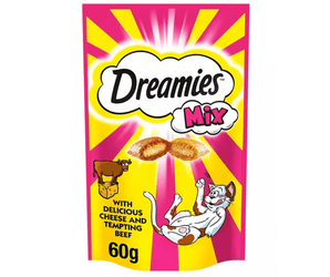 White background with a pink and yellow packet of Dreamies with Delicious cheese and Tempting Beef pictured. On the packet is an illustrated cartoon cat on it's back with an image of the treats above it and an illustrated fish. Text on the pack reads 'Dreamies, soft inside, crunchy outside, with Delicious cheese and Tempting Beef.' 