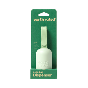 White background with Earth Rated poop bag dispenser in green cardboard packaging. On the packaging is text 'includes 15 bags'. 
