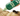 Hand holding a green bottle of Earth Rated Short Coat Dog Shampoo whilst applying it to a pug's short coat.