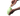 White background with a pair of hands pictured filling a pale green Earth Rated Treat dog toy with dog treats.