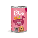 White background with a can of Edgard and Cooper wet puppy food pictured. Text on the foil of the tray says 'Bio Organic, Fabulous duck & chicken, banana, pumpkin, pea. Grain-free recipe' 