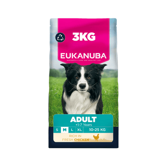 A 3kg bag of Eukanuba Adult dog food, specifically the Fresh Chicken flavor. The packaging features a black and white Border Collie on a green grassy field, with a bright pink top banner and a teal lower banner indicating it is for adults 1-7 years.