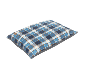 Pillow-type blue checked dog bed with a grey underside pictured on a white background. 