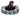 Dog sitting in a blue plaid pet bed with 'Fatface' branding on a white background