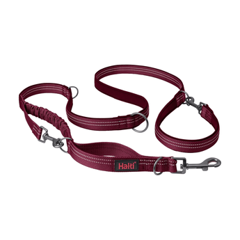 White background with a Magenta Halti Anatomy Multi Lead with a metal clips and loops. 