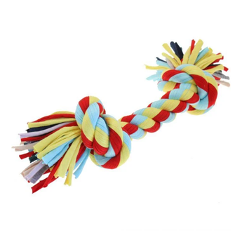 A colourful braided dog toy with knotted ends, made from twisted rope in red, yellow, and light blue, with additional multi-coloured strips visible at the tips, shown on a plain white background.