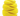 A close up of a yellow Grrrelli Rope Tugger Dog Toy textured rubber dog toy, isolated on a white background.