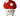 White background with a large Happy Pet mushroom dog toy with a stitched smiley face and red and white cap.