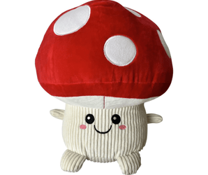 White background with a large Happy Pet mushroom dog toy with a stitched smiley face and red and white cap.