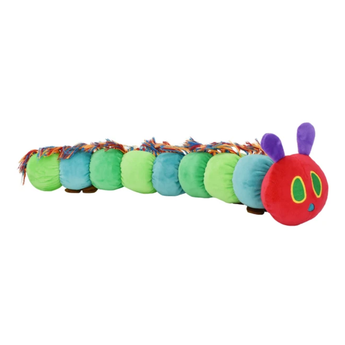 A plush dog toy shaped like the character the Very Hungry Caterpillar, shown on a plain white background. The toy has green and light blue segments with multicoloured fringed details, a red head, purple antennae, and green and yellow facial features.