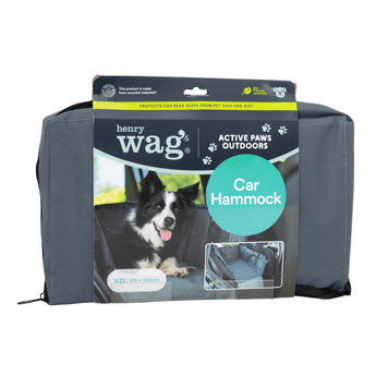 White background with a Henry Wag Car Hammock in a grey pouch in cardboard packaging with a collie dog pictured on it.