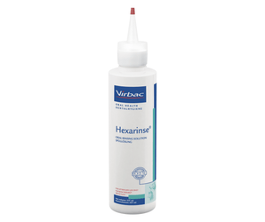 White background with a bottle of Virbac Hexarinse Oral rinsing solution pictured. 