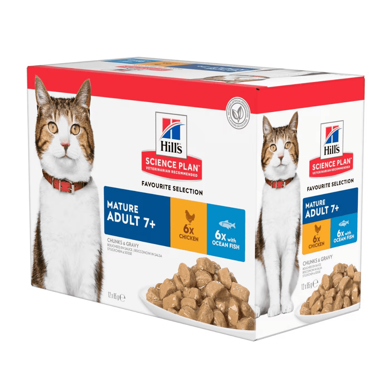 Box of Hills wet cat food with a brown and white tabby cat pictured on the packet, text on pouch says 'Mature Adult 7+' and '6x Chicken, 6x with Ocean Fish' below is a picture of the wet food. 