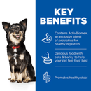Picture of an adult black and brown dog pictured next to a blue section with white text stating 'Key Benefits, Contains ActivBiome+ an exclusive blend of probiotics for healthy digestion, Delicious food with oats & barley to help your pet feel their best, Promotes healthy stool'. 