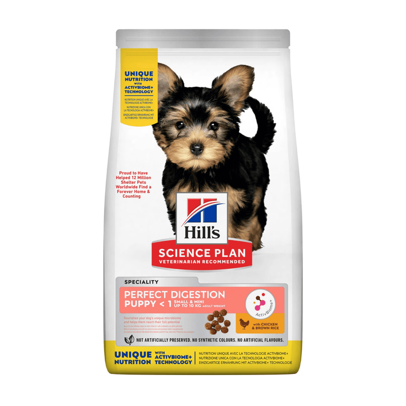 Hills Science Plan dry dog food packaged in a white bag with Yorkshire terrier puppy pictured on the bag. Text on bag say 'Hill's Science Plan, veterinarian recommended' and 'Perfect Digestion, Small & Mini, Puppy <1' with a chicken pictured with text 'with chicken & brown rice' beneath on white background. 