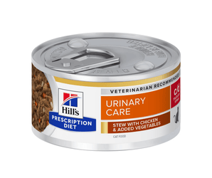 Hills Prescription cat food tin with a bowl full of food pictured on the label, text reads 'Urinary Care, C/D Multicare Stress' and 'Stew with chicken & added vegetables' on a white background. 