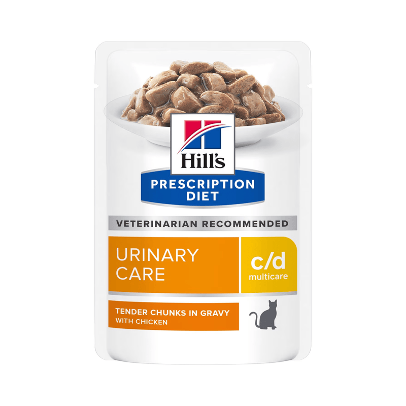 Hills Prescription cat food pouch with a bowl full of food pictured on the packet, text reads 'Urinary Care, C/D Multicare' and 'Tender chunks in Gravy with Chicken' on a white background. 
