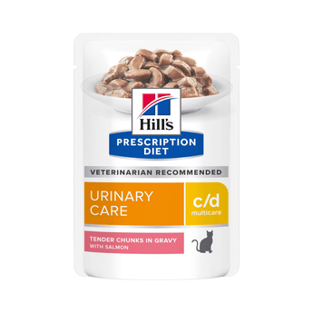 Hills Prescription cat food pouch with a bowl full of food pictured on the packet, text reads 'Urinary Care, C/D Multicare' and 'Tender chunks in Gravy with Salmon' on a white background. 