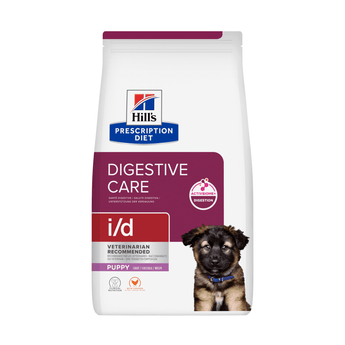 A bag of Hill's Prescription Diet i/d Digestive Care Puppy dog food, featuring a white bag with a dark purple label, a picture of a puppy, and the Hill's logo.