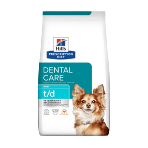 Hills Prescription Diet Dental Care Mini T/D dry dog food packaged in a white bag with an adult Chihuahua dog pictured on the bag. Text on bag says 'Hill's Prescription Diet, Dental Care' and 'Mini T/D, Veterinarian recommended' pictured on white background. 