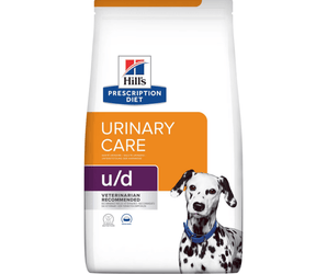 Hills Prescription Diet Urinary Care dry dog food packaged in a white bag with an adult Dalmatian dog pictured on the bag. Text on bag says 'Hill's Prescription Diet, Urinary Care' and 'U/D, Veterinarian recommended' pictured on white background. 