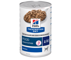 Hills Prescription dog food tin with a spoon full of food pictured on the label, text reads 'Food Sensitivities Z/D' and 'Original' on a white background. 